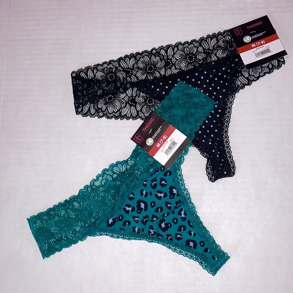 NWT lot of Lace trimmed thongs size medium 7/9